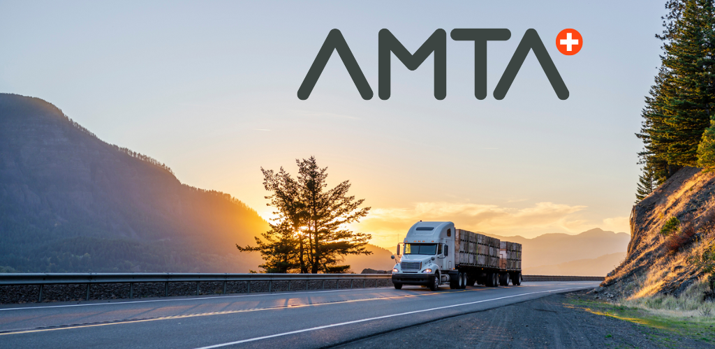 AMTA+ logo with semi truck driving on highway in the mountains